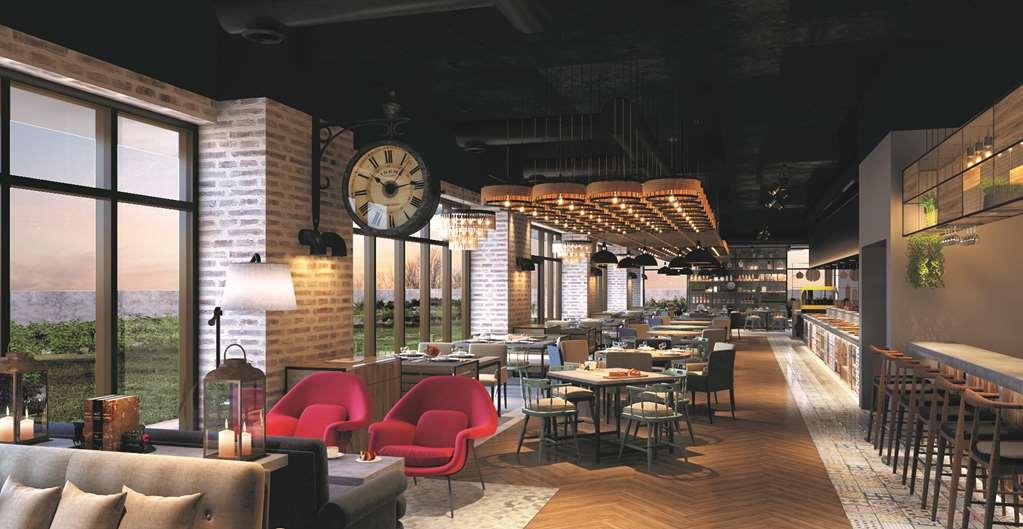 Hyatt Place Jaipur Malviya Nagar Restaurante foto The interior of the restaurant